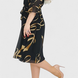 Amelie Vestido Midi Estampado con Cinturón y Corte Versátil